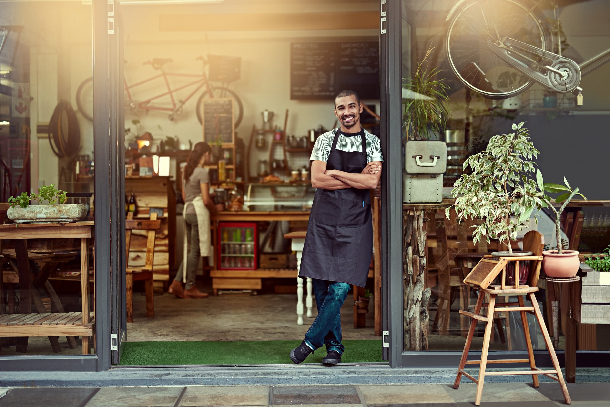 Owner Standing in Front of Store